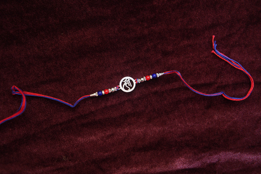 Silver Rakhi with Roli Chawal