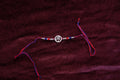 Silver Rakhi with Roli Chawal