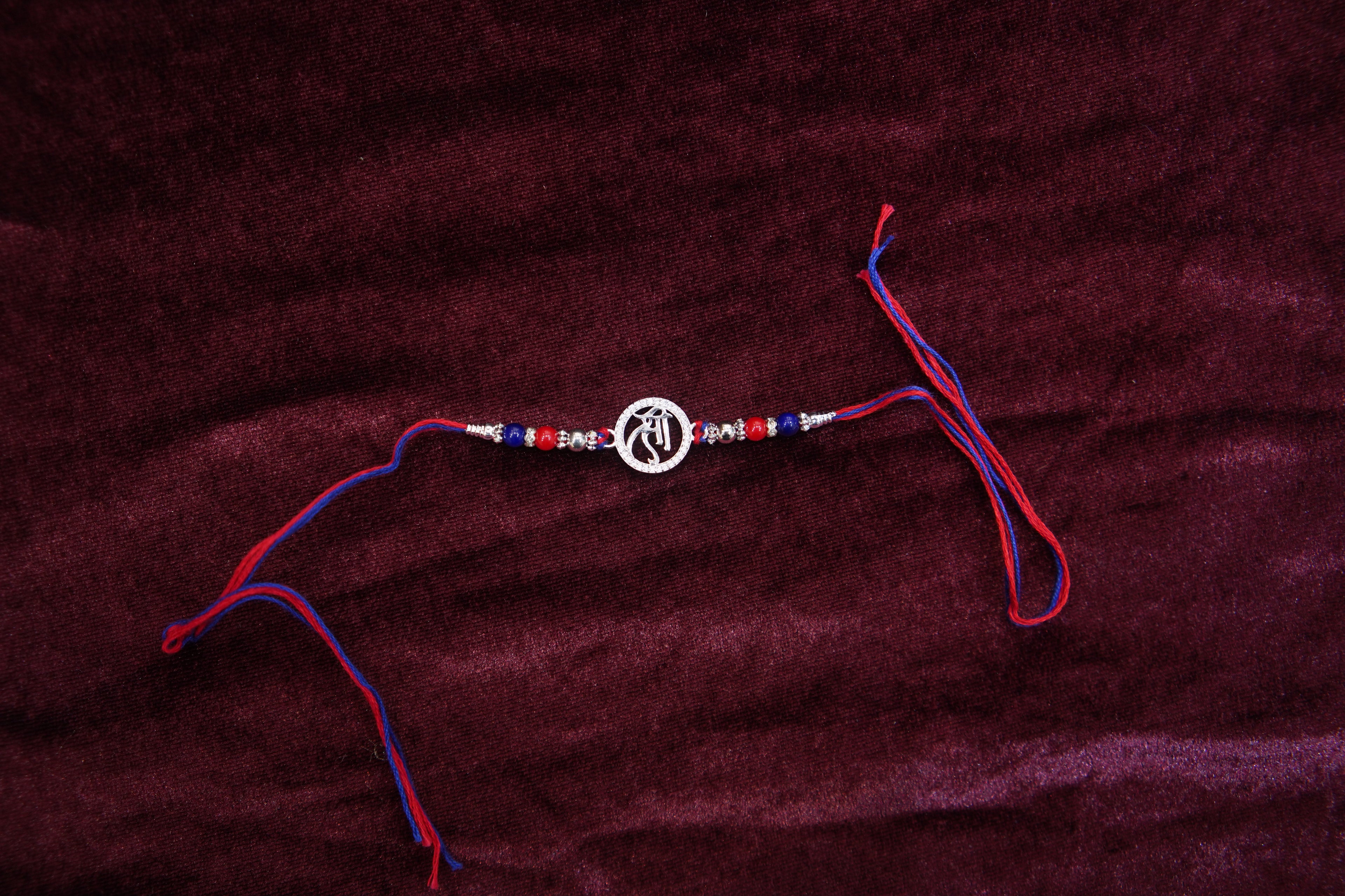 Silver Rakhi with Roli Chawal