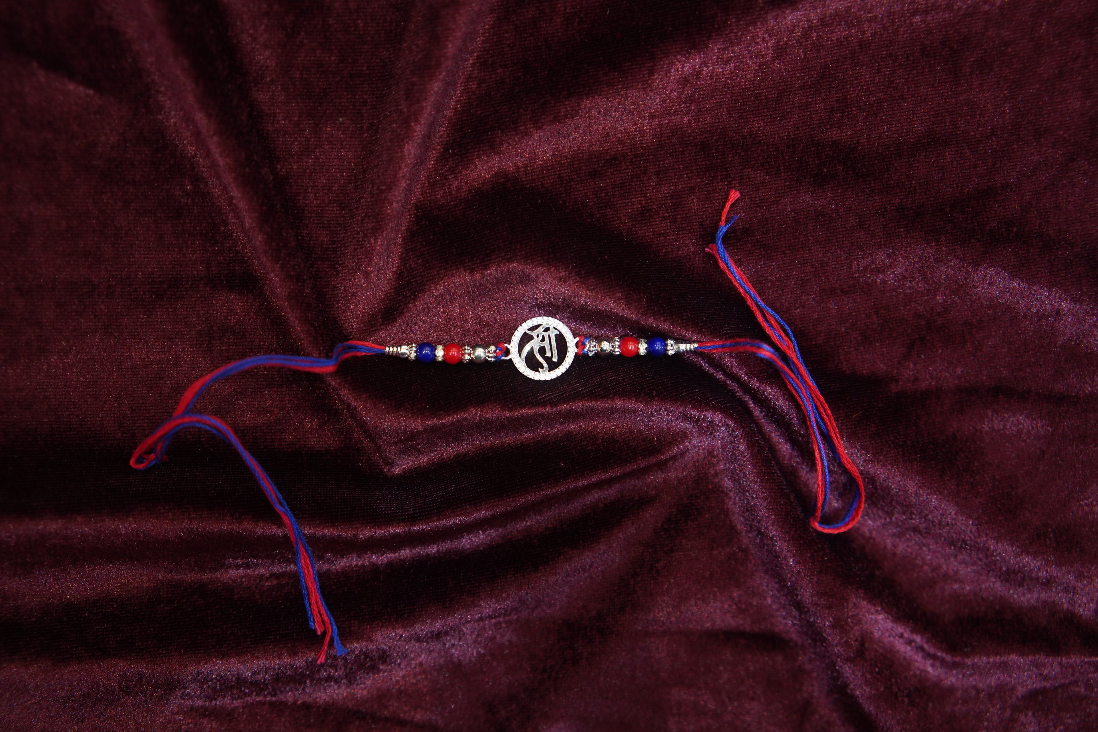 Silver Rakhi with Roli Chawal