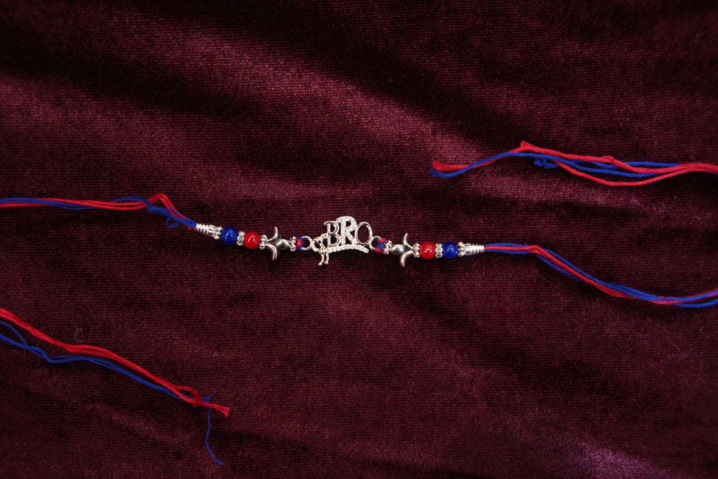 Silver Rakhi with Roli Chawal