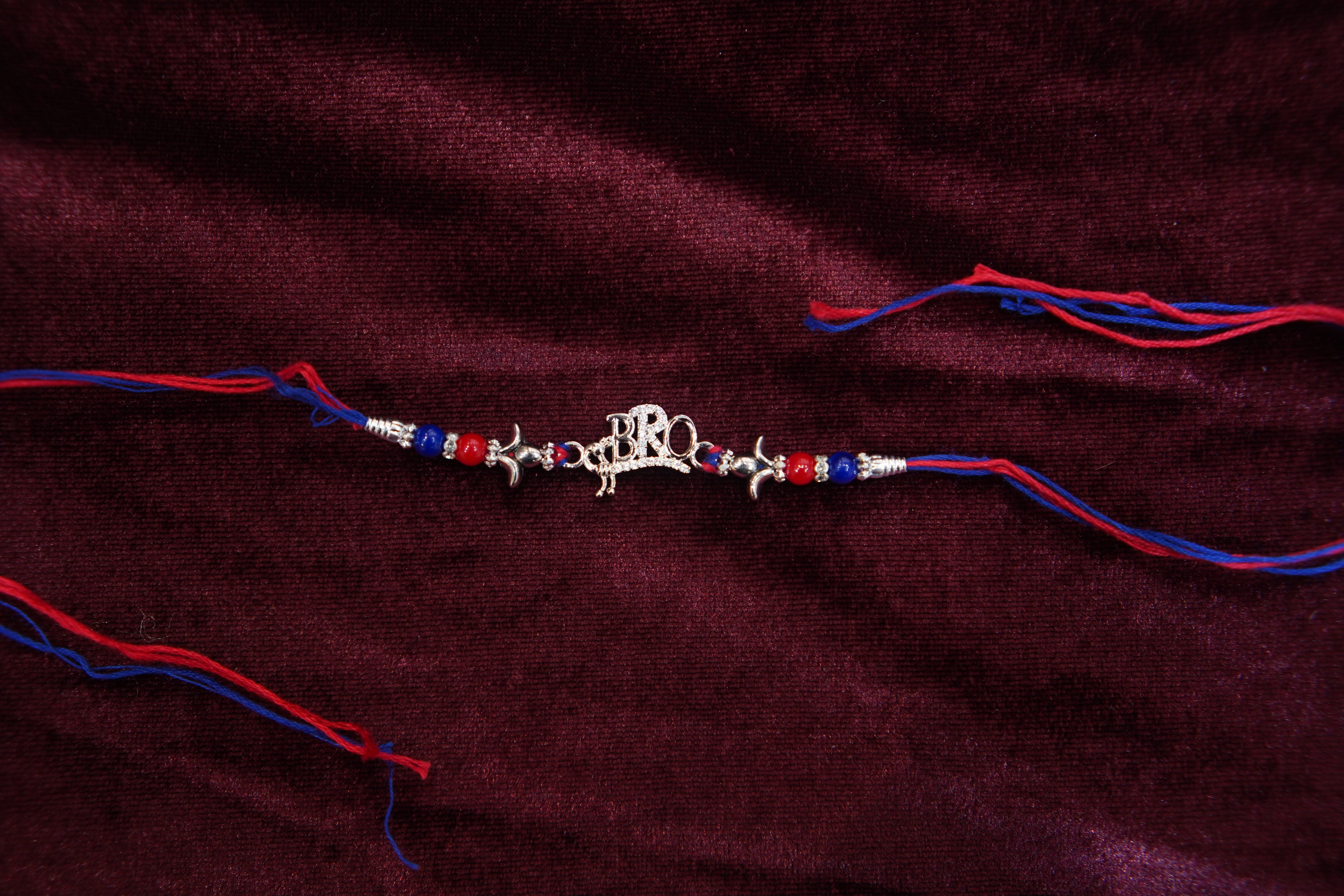 Silver Rakhi with Roli Chawal