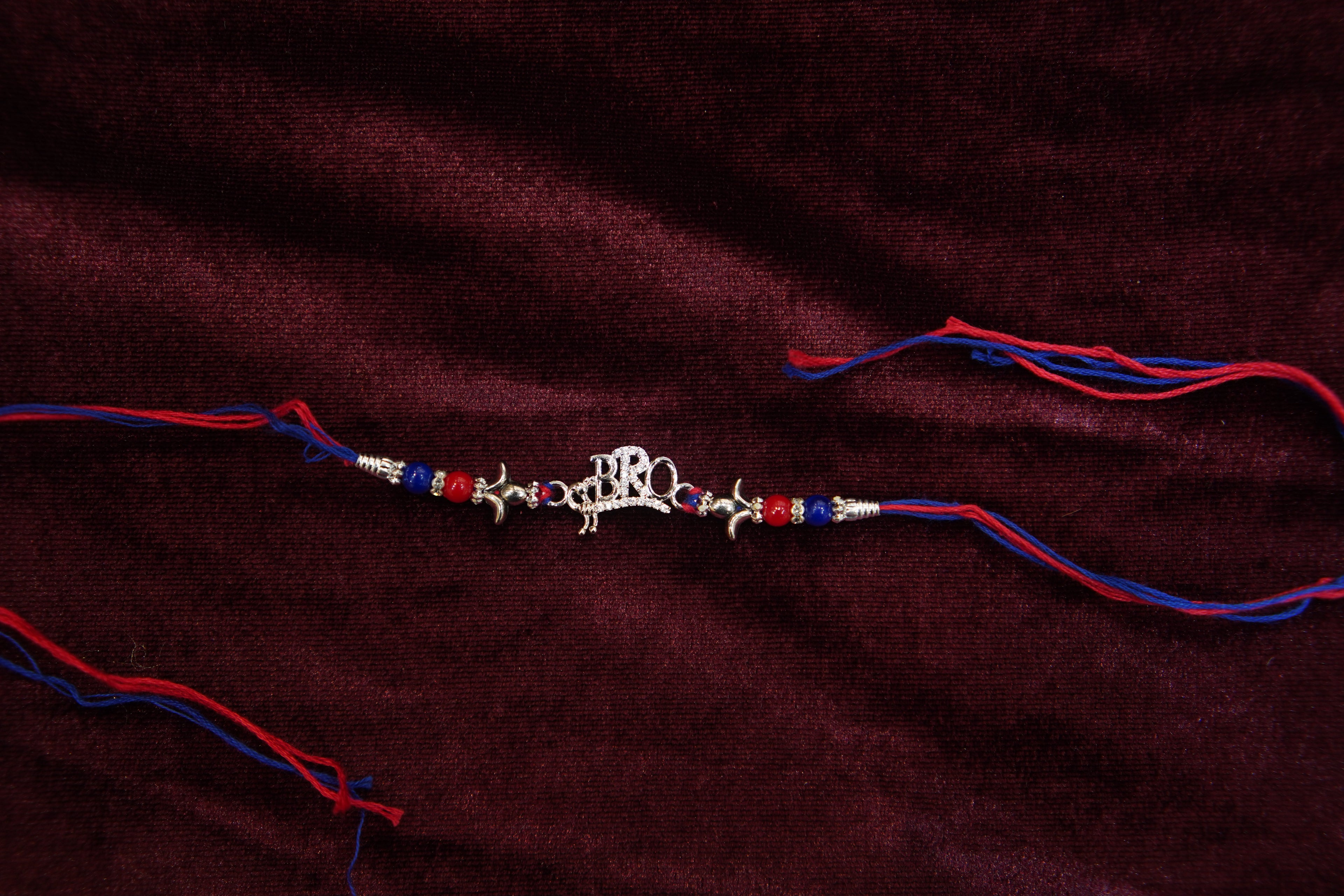 Silver Rakhi with Roli Chawal