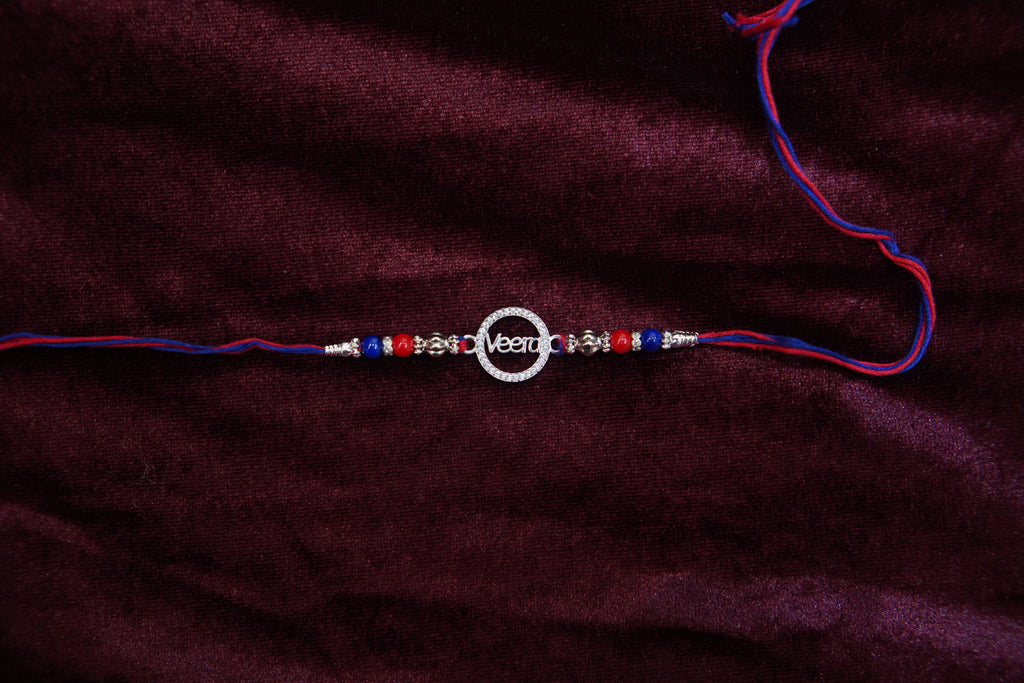 Silver Rakhi with Roli Chawal