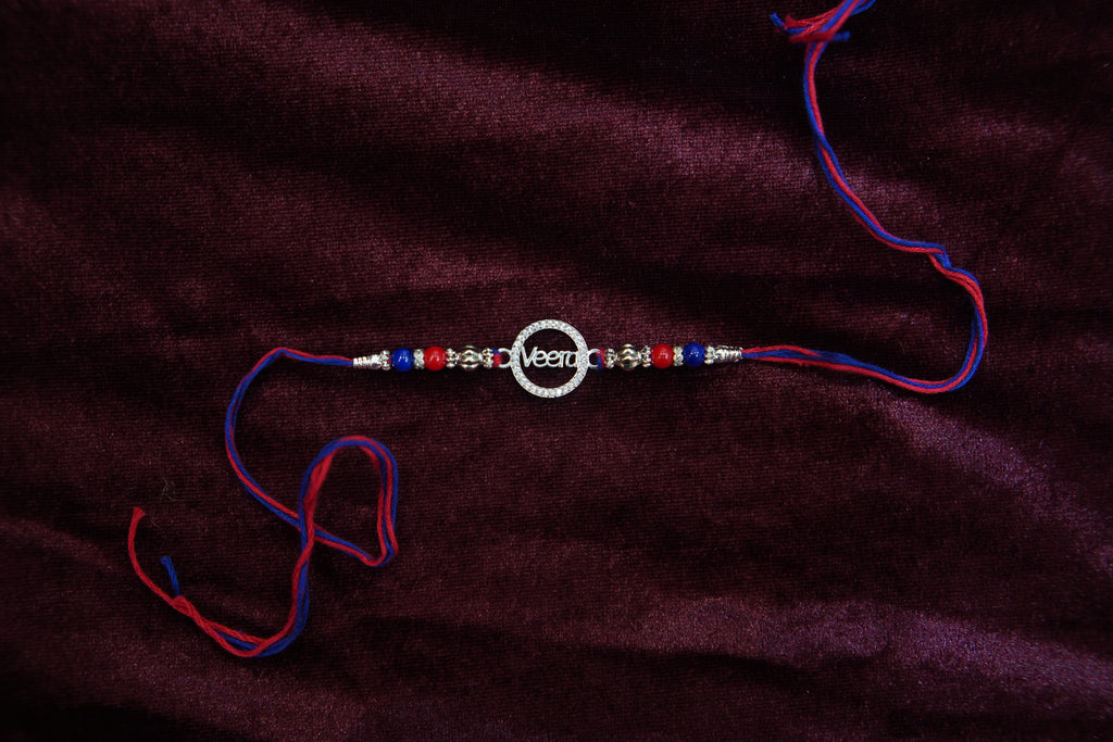Silver Rakhi with Roli Chawal