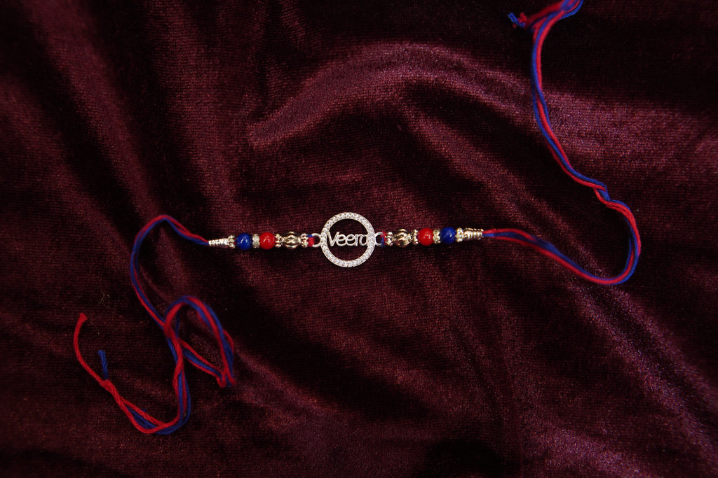 Silver Rakhi with Roli Chawal