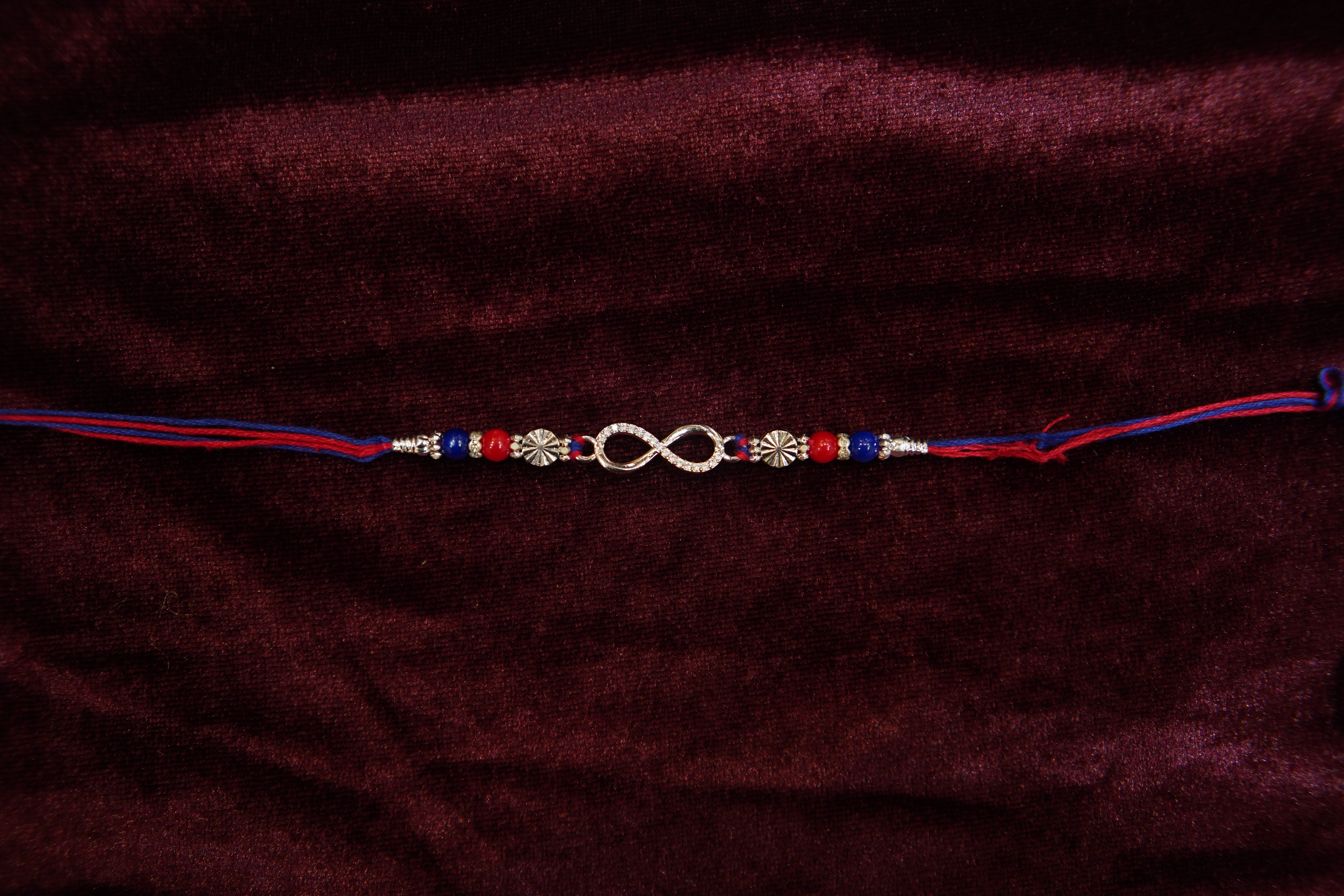 Silver Rakhi with Roli Chawal