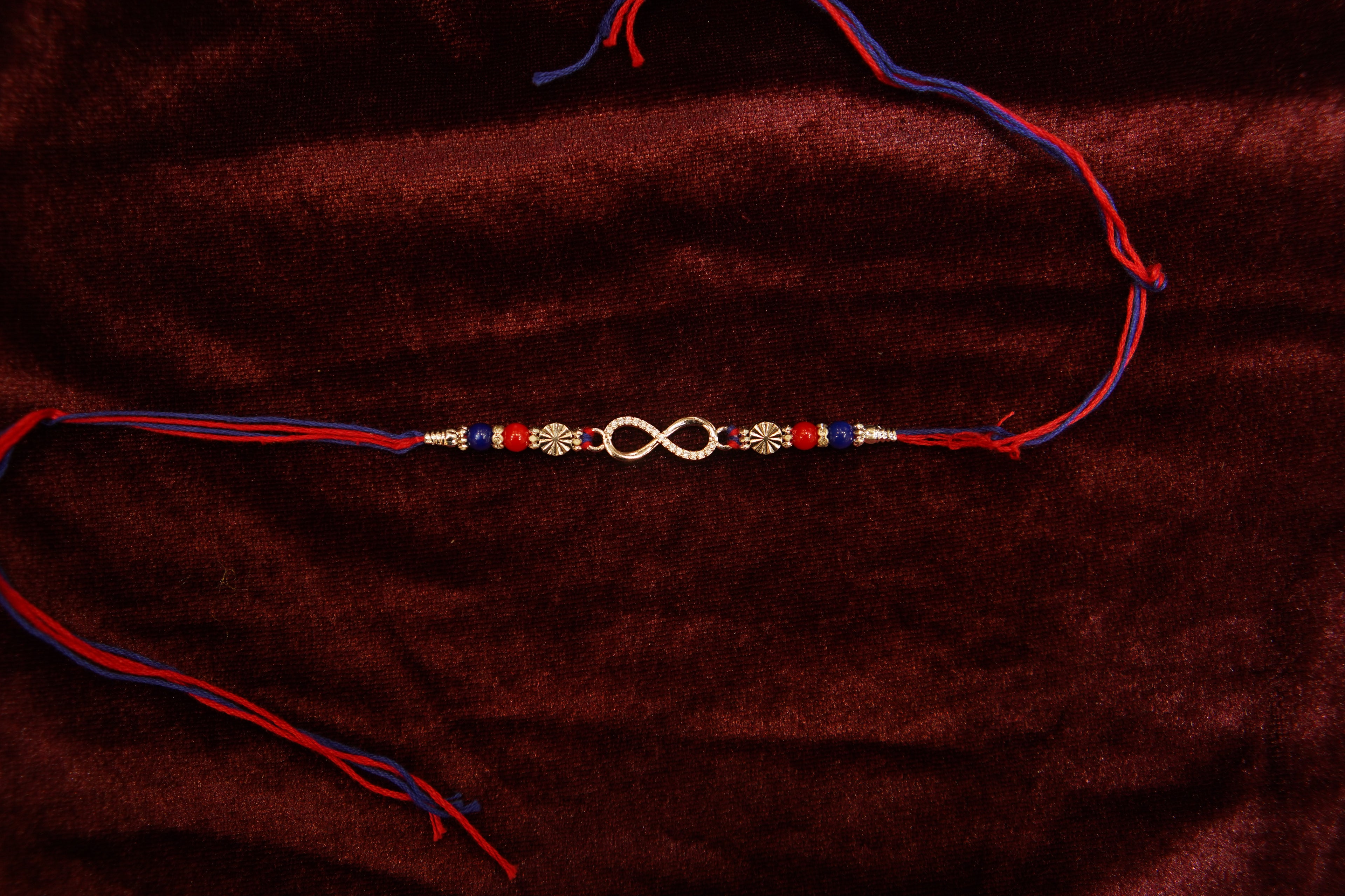 Silver Rakhi with Roli Chawal