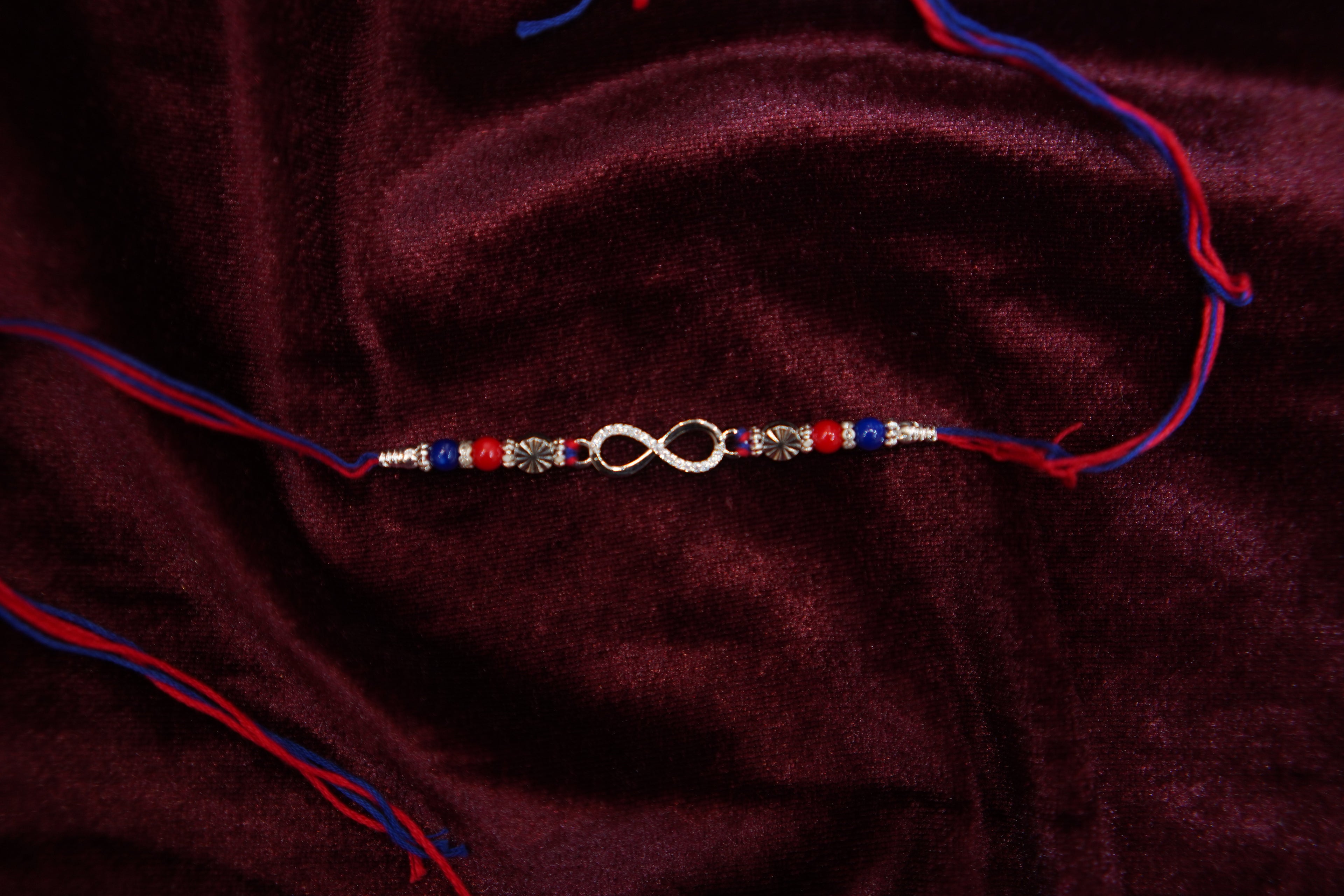 Silver Rakhi with Roli Chawal