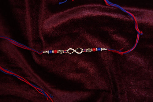 Silver Rakhi with Roli Chawal