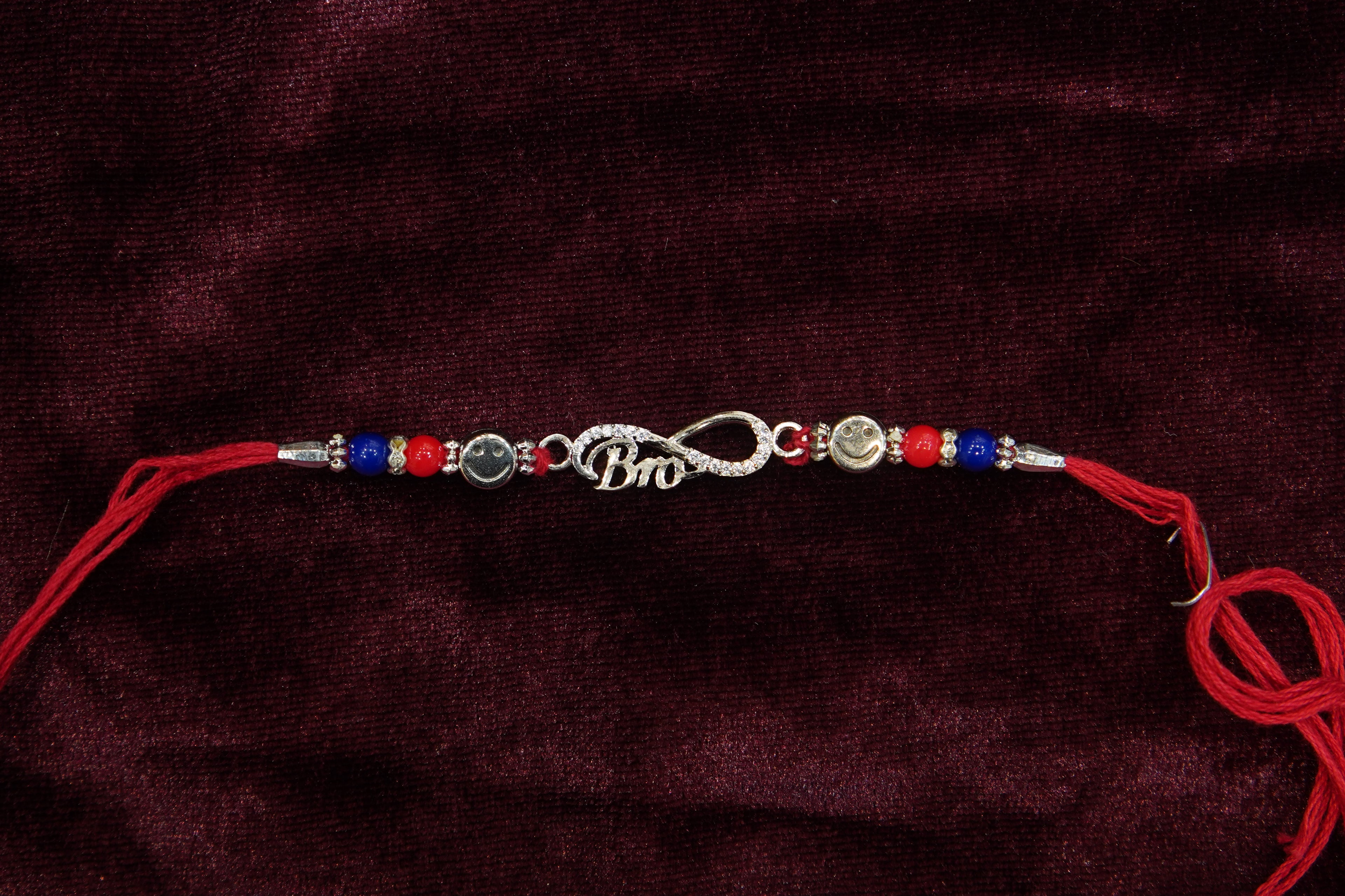 Silver Rakhi with Roli Chawal