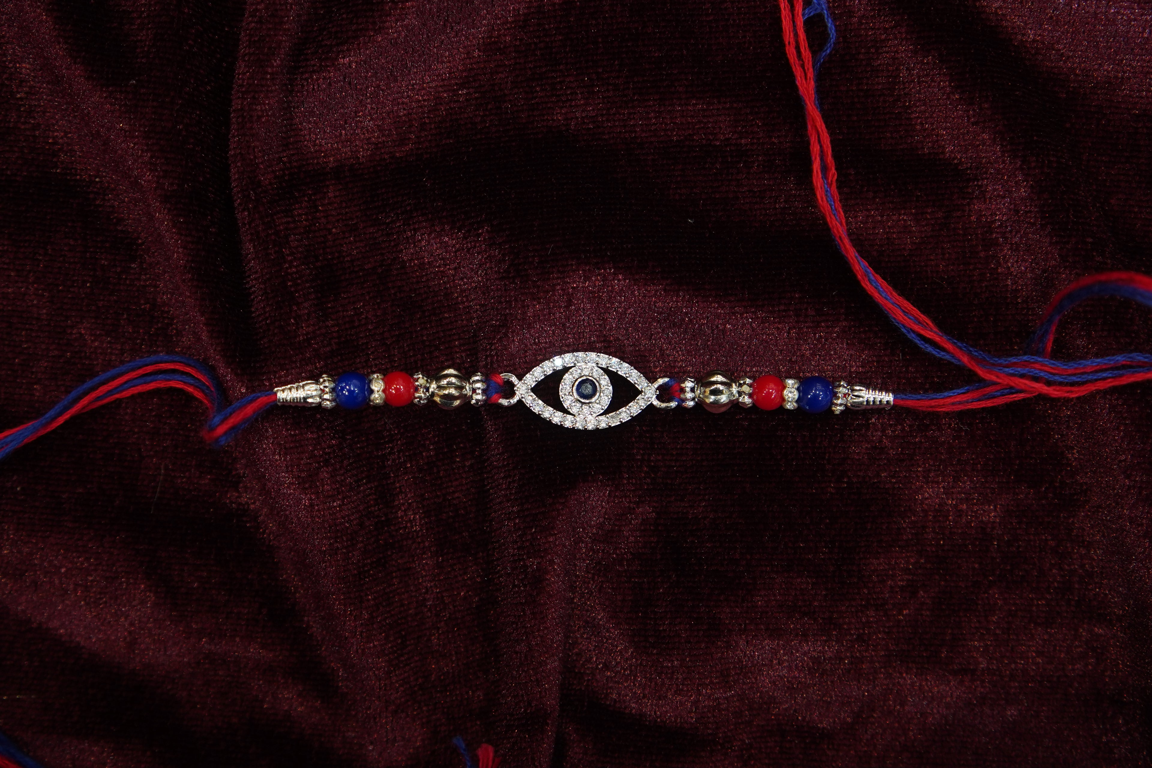 Silver Rakhi with Roli Chawal
