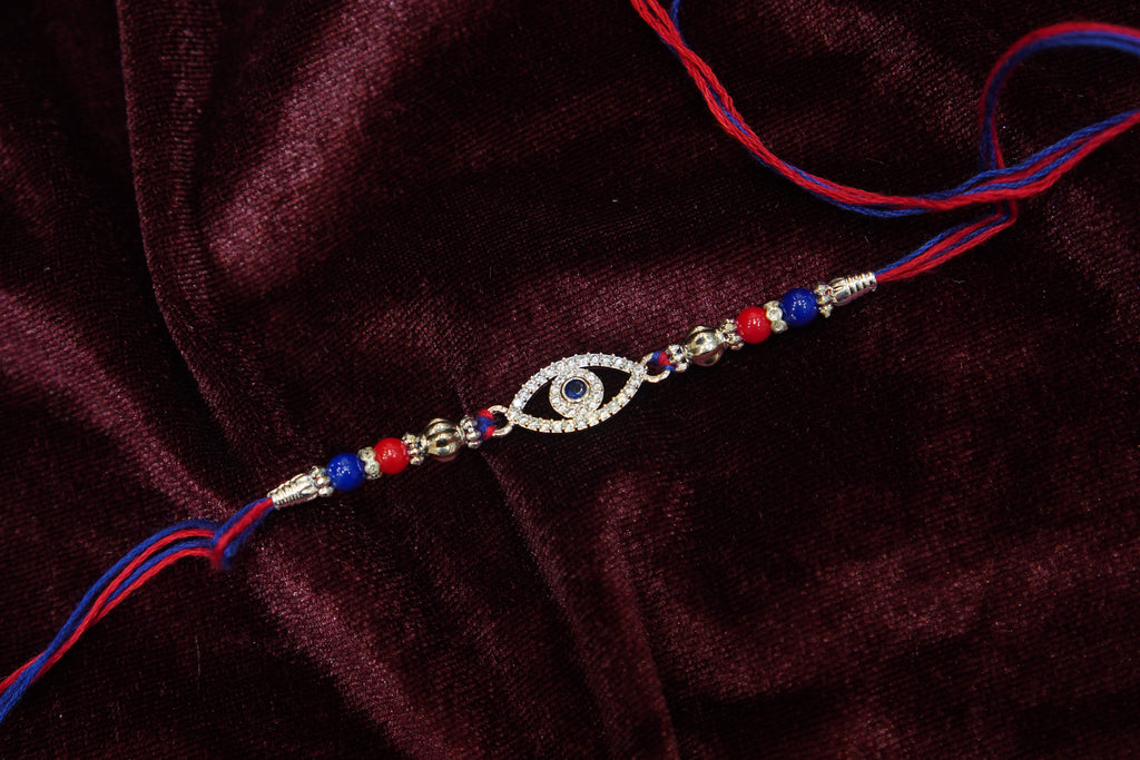 Silver Rakhi with Roli Chawal