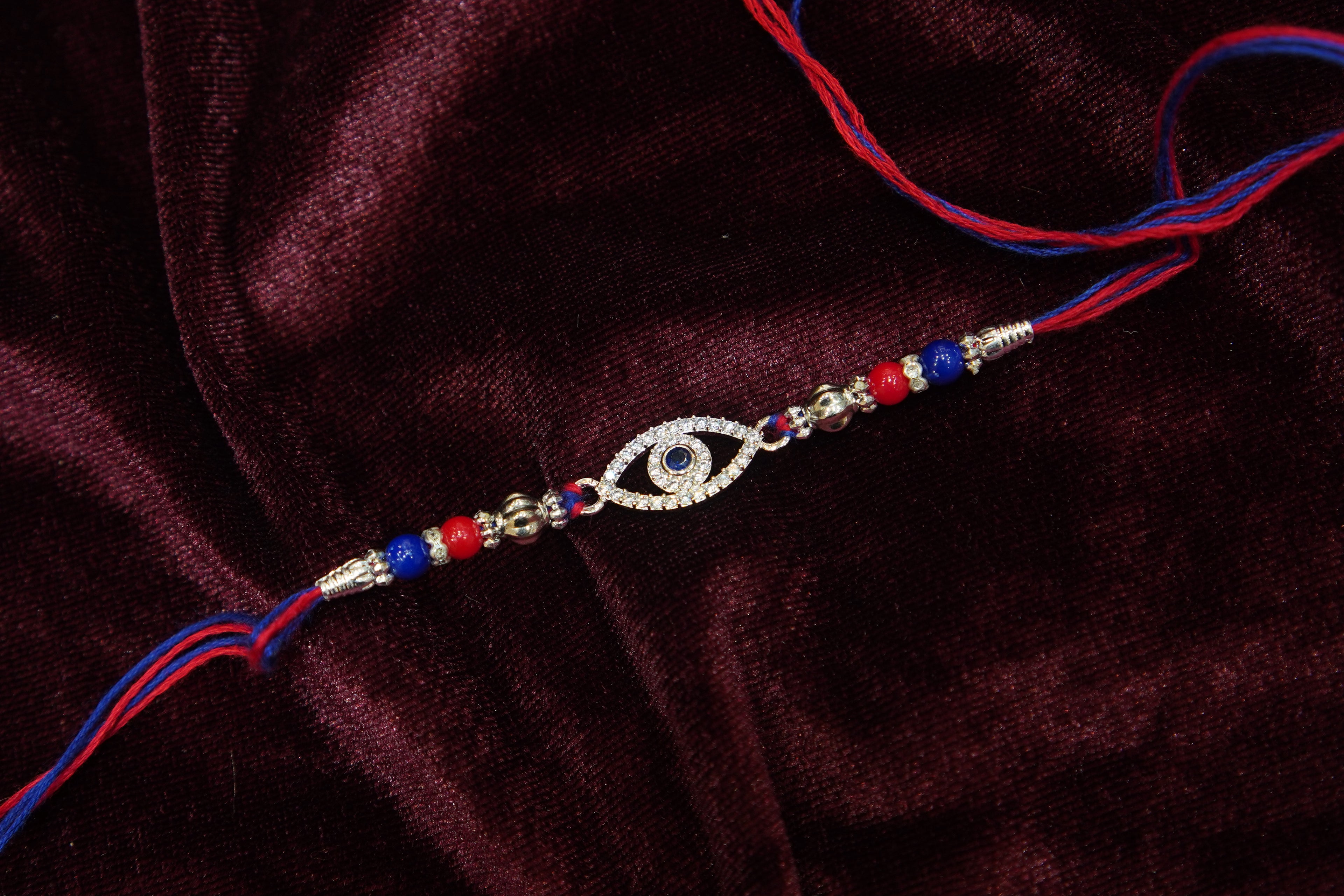 Silver Rakhi with Roli Chawal