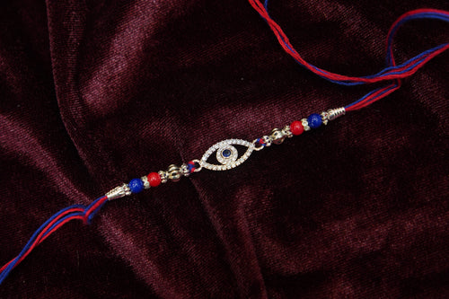 Silver Rakhi with Roli Chawal