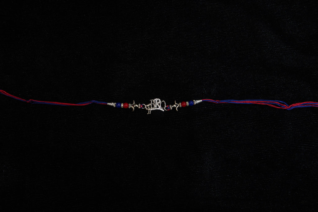 Silver Rakhi with Roli Chawal