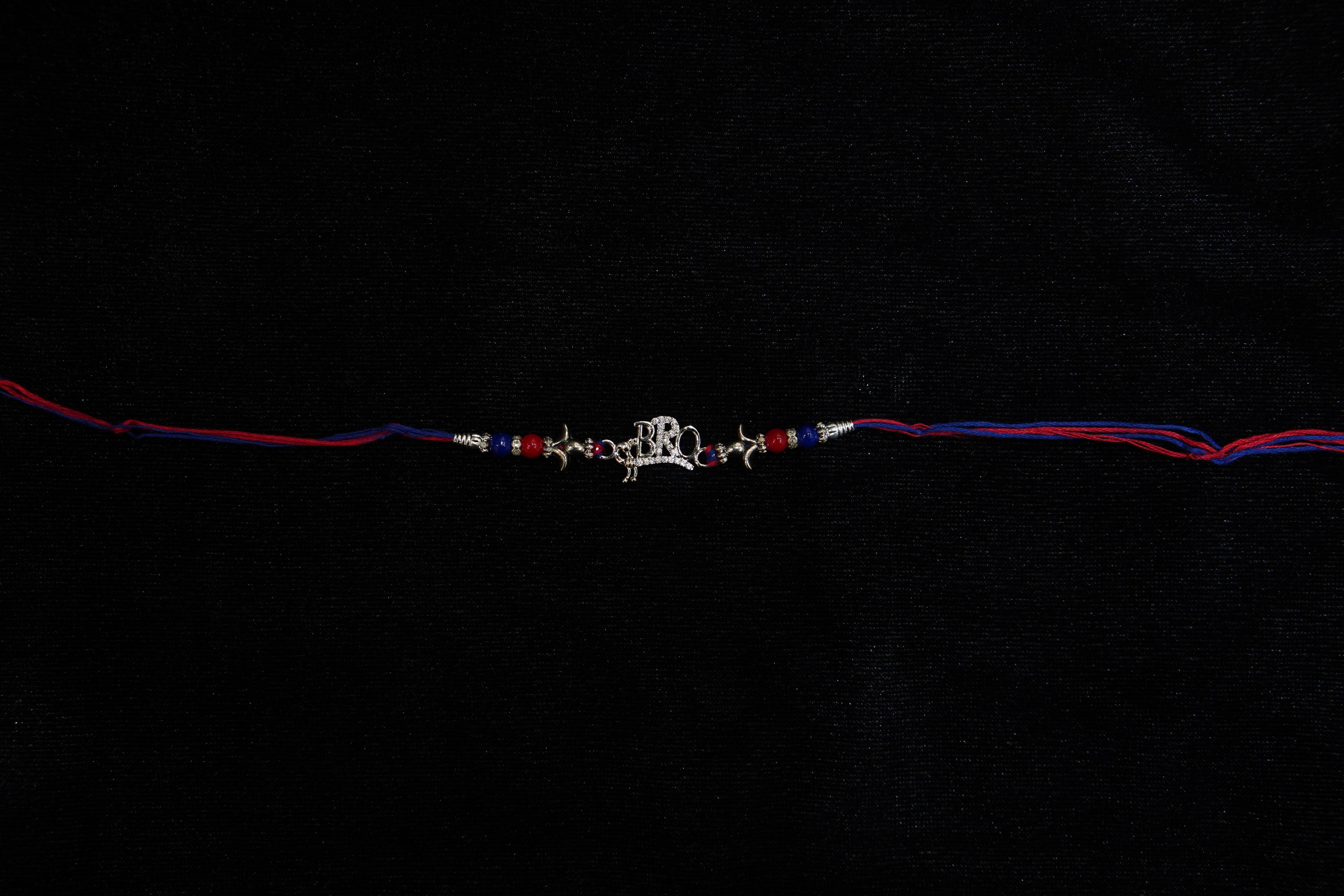 Silver Rakhi with Roli Chawal