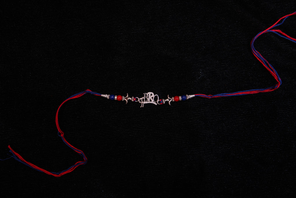 Silver Rakhi with Roli Chawal