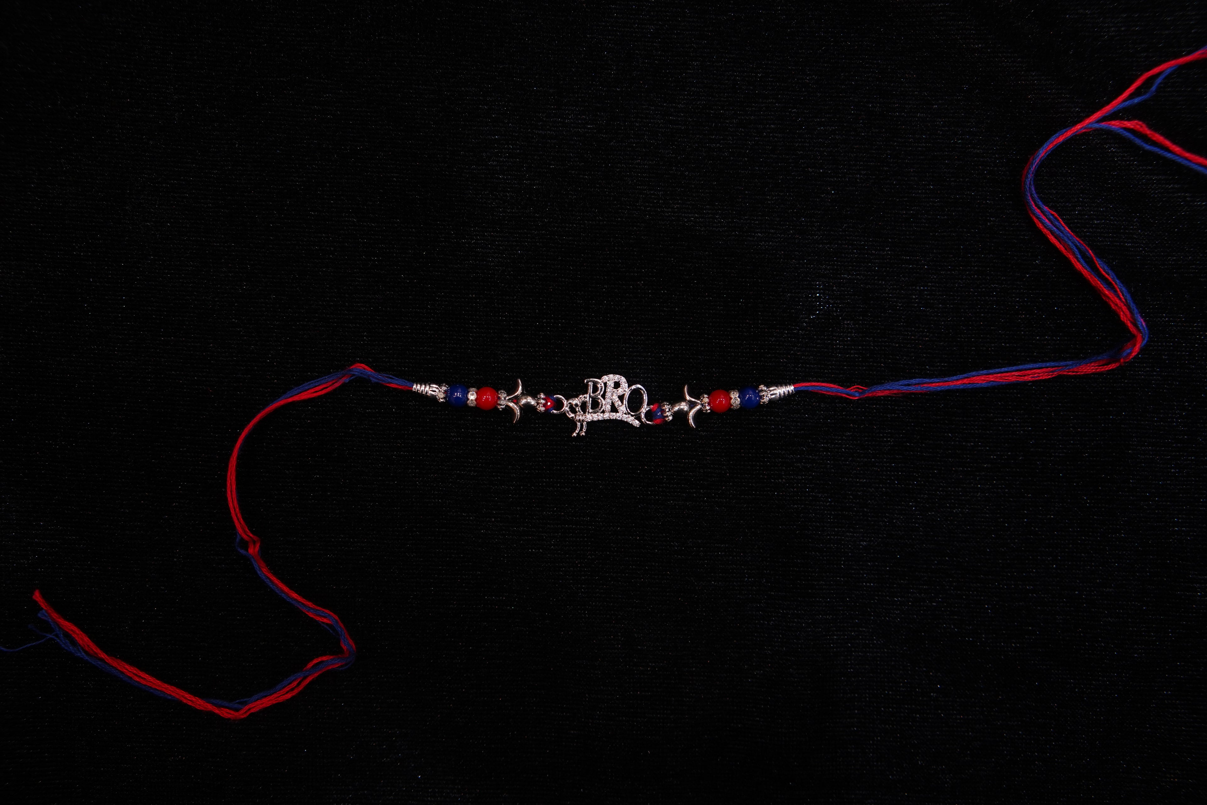 Silver Rakhi with Roli Chawal