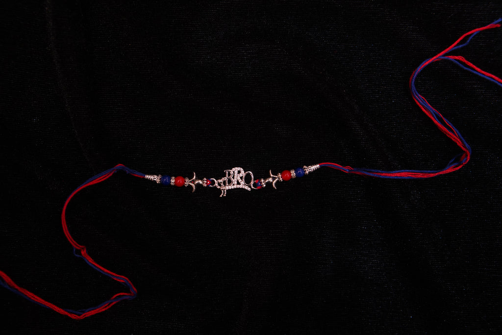 Silver Rakhi with Roli Chawal