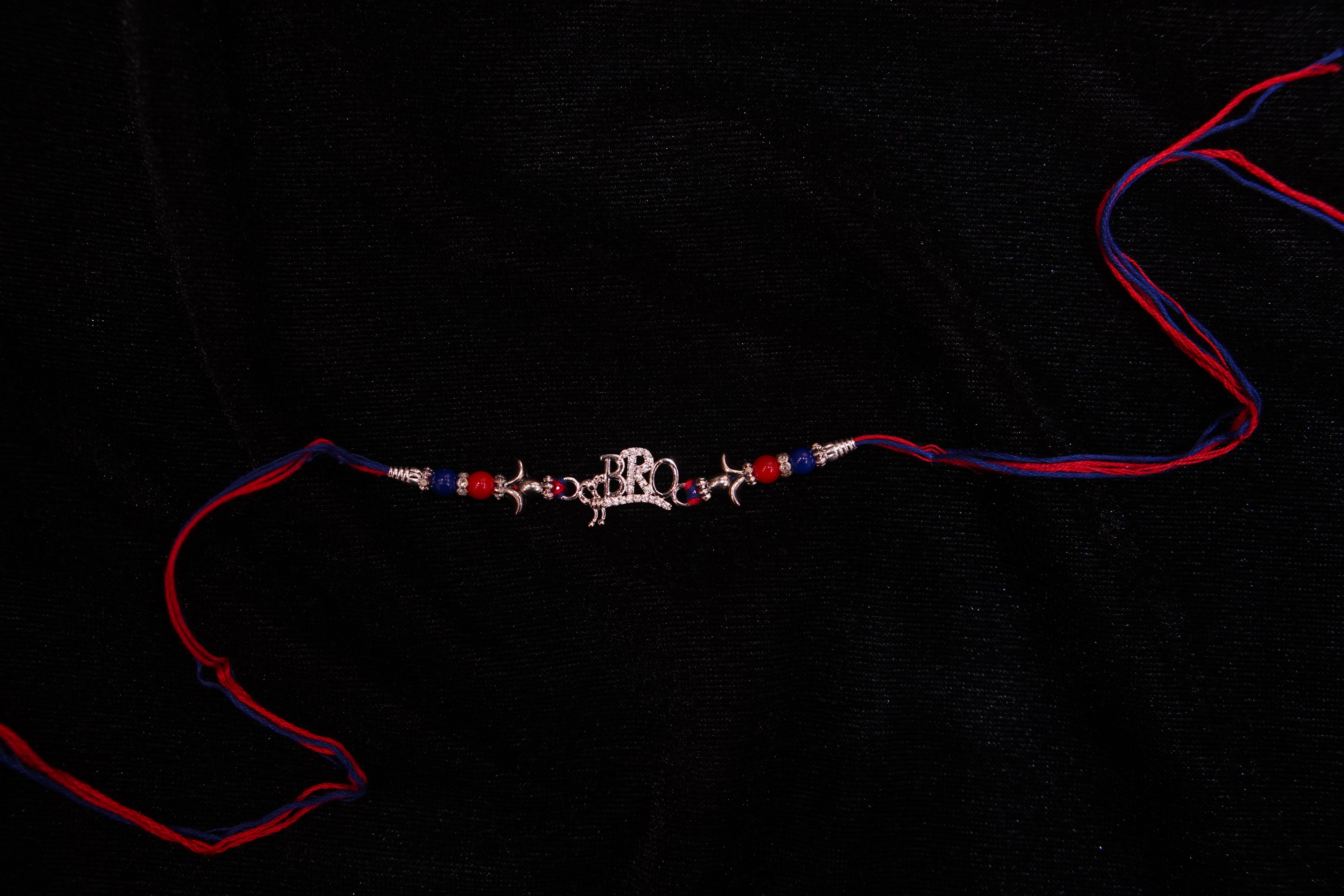 Silver Rakhi with Roli Chawal