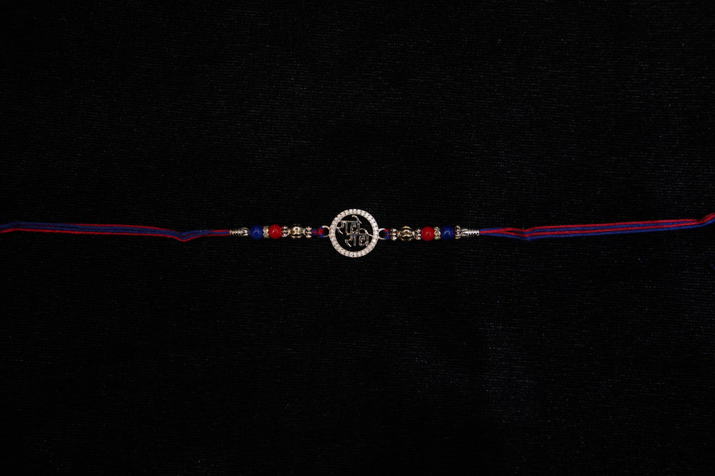 Silver Rakhi with Roli Chawal