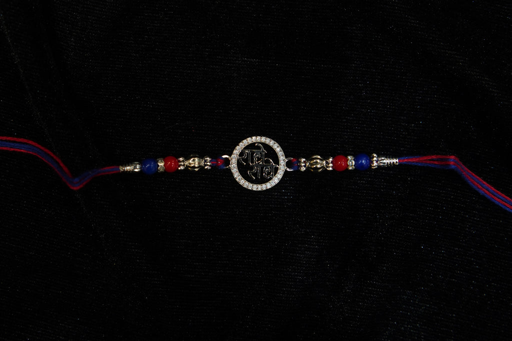 Silver Rakhi with Roli Chawal