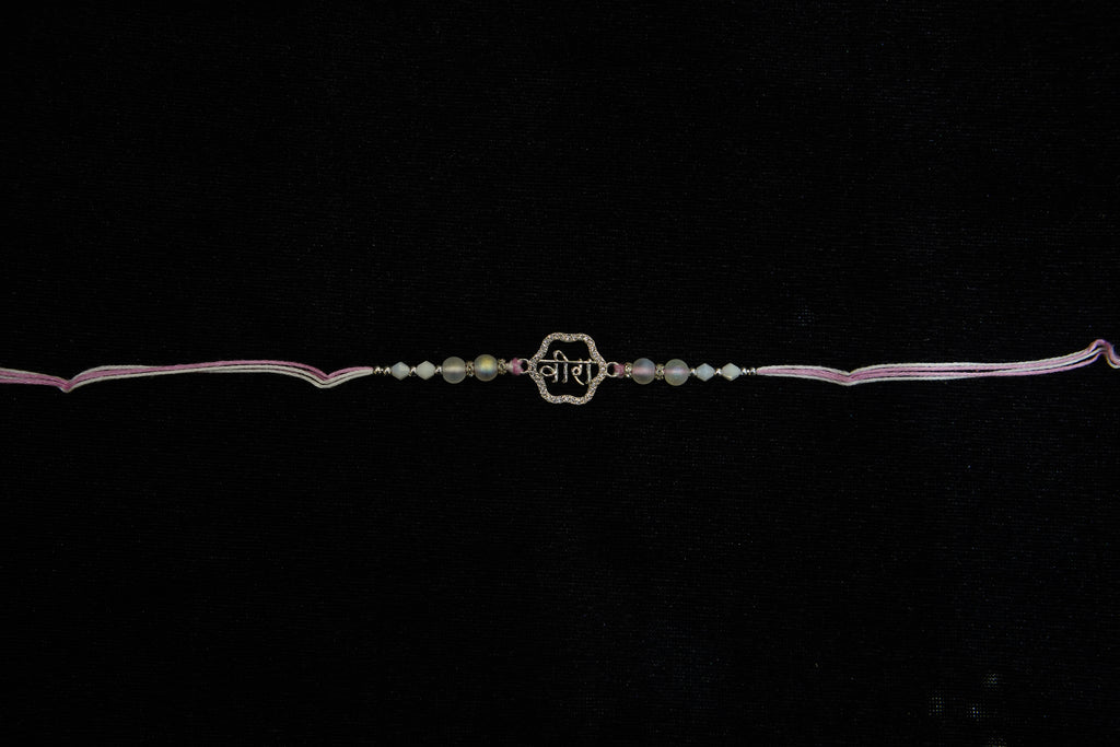 Silver Rakhi with Roli Chawal