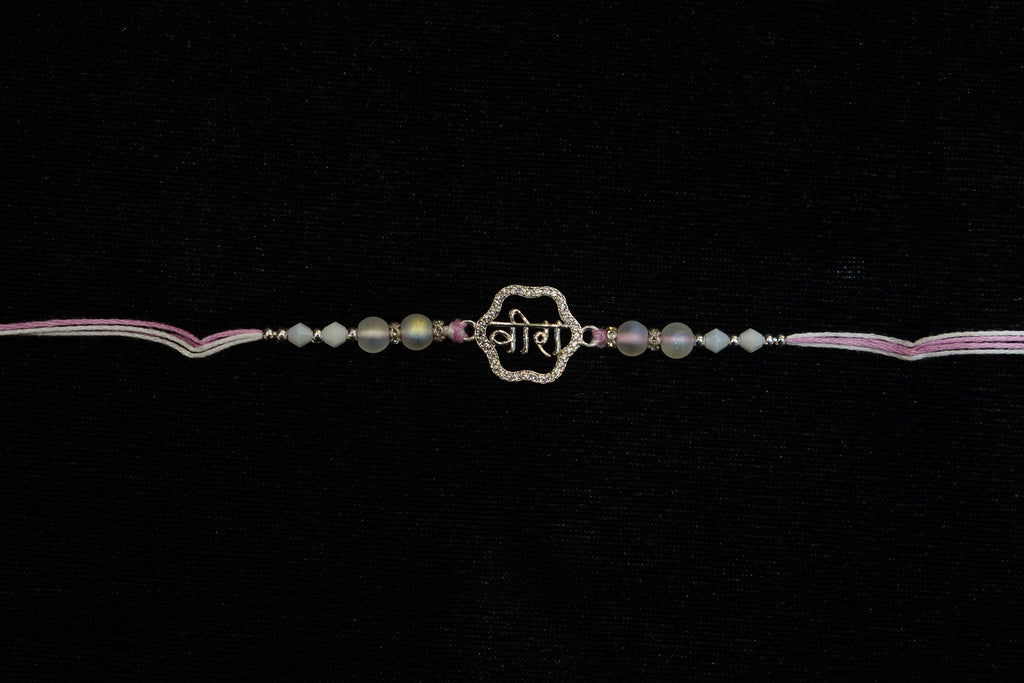 Silver Rakhi with Roli Chawal