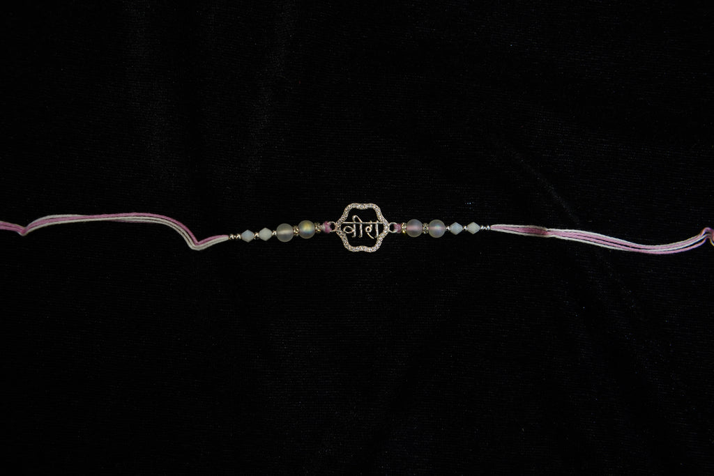 Silver Rakhi with Roli Chawal