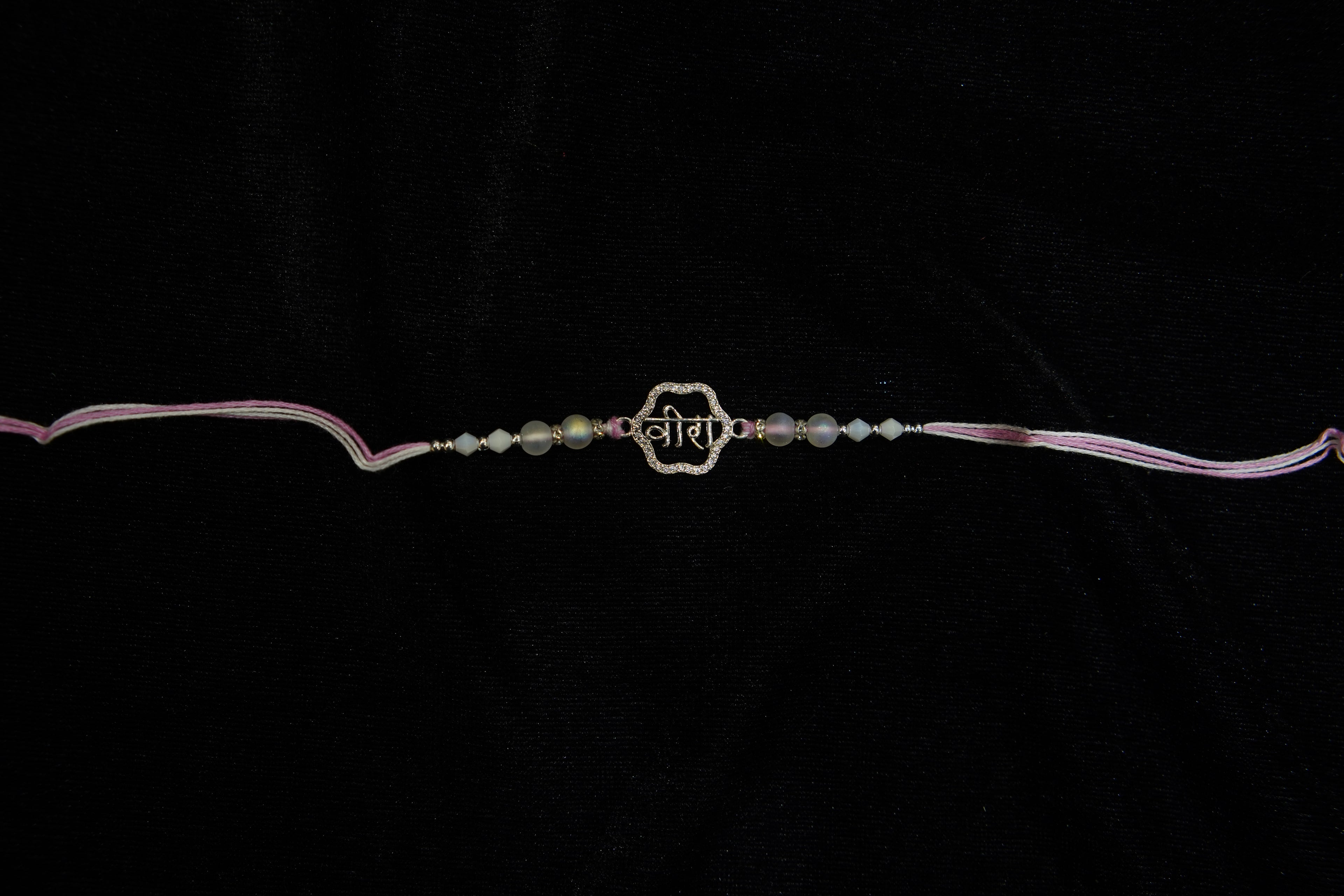 Silver Rakhi with Roli Chawal