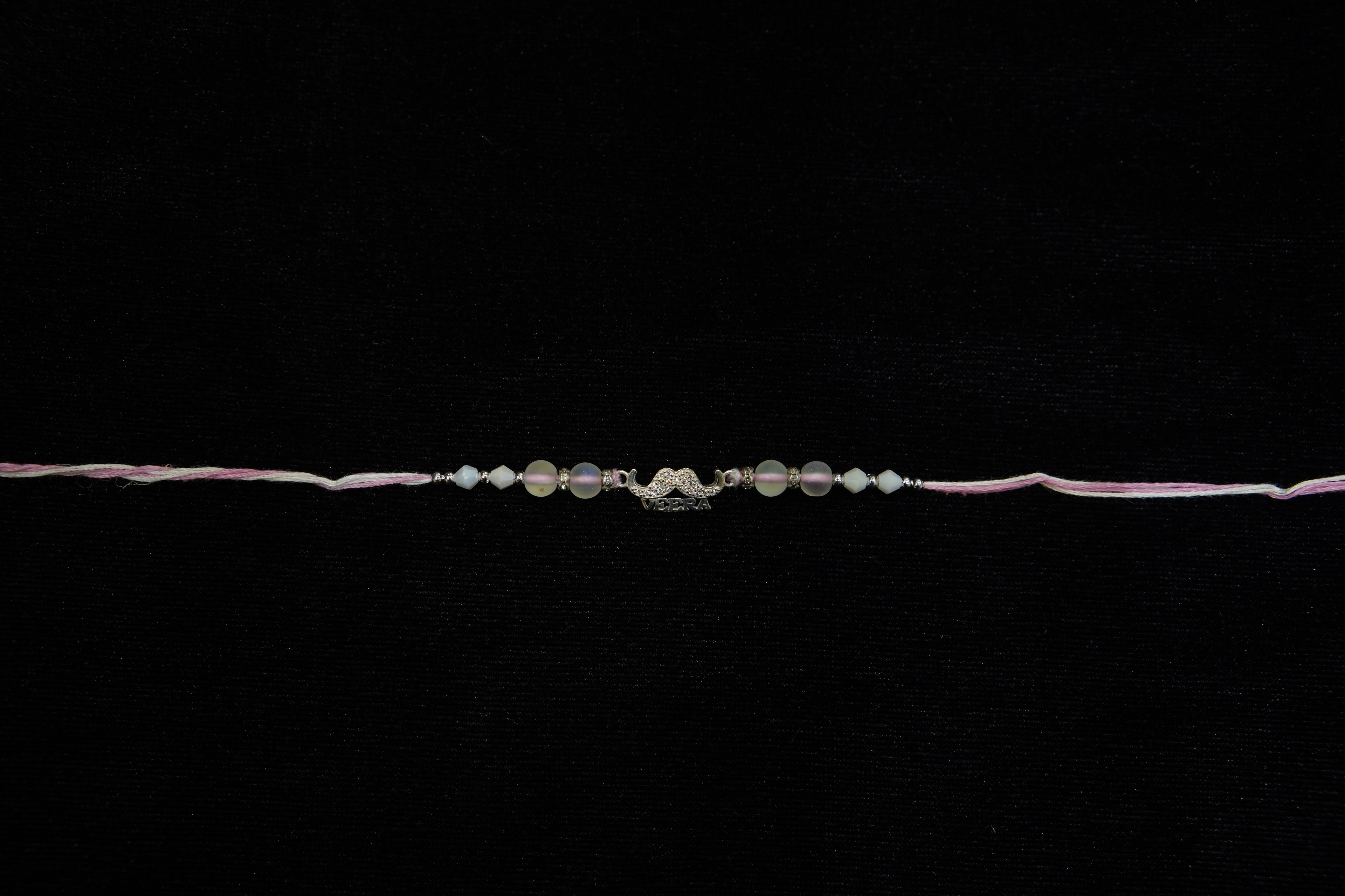 Silver Rakhi with Roli Chawal
