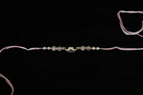 Silver Rakhi with Roli Chawal