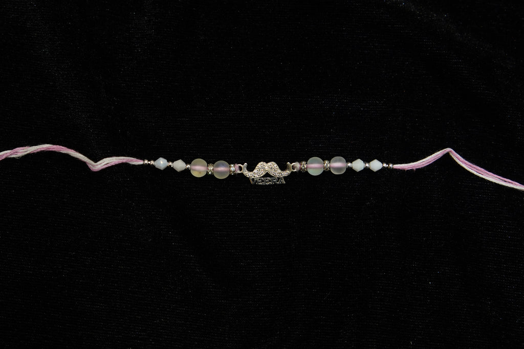 Silver Rakhi with Roli Chawal