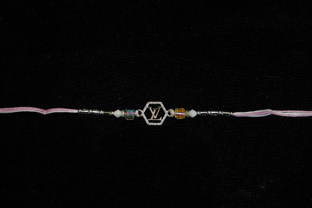 Silver Rakhi with Roli Chawal