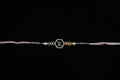 Silver Rakhi with Roli Chawal