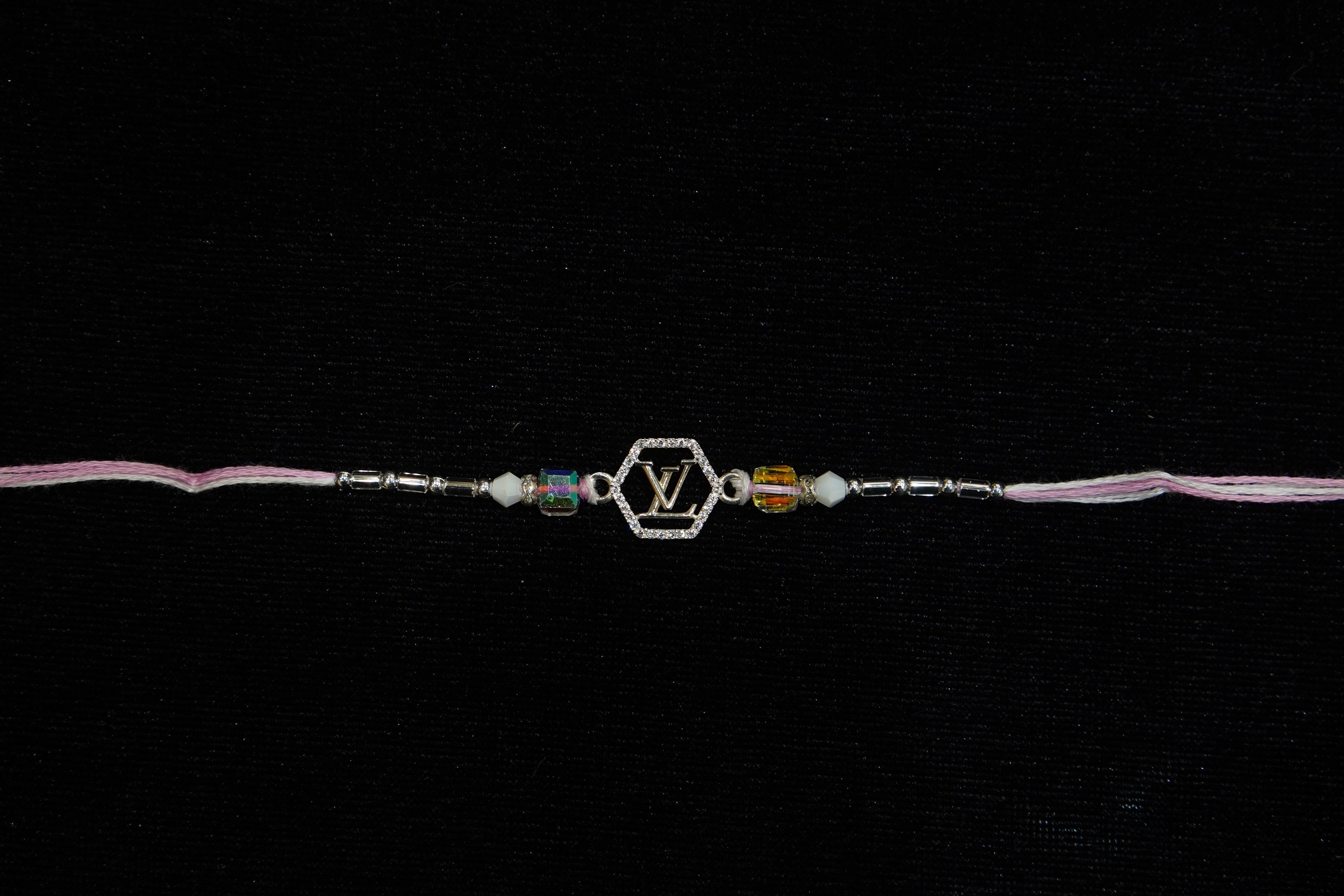 Silver Rakhi with Roli Chawal