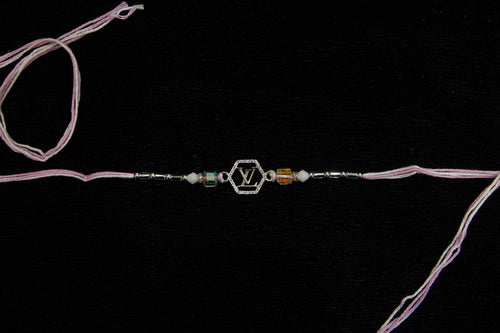 Silver Rakhi with Roli Chawal