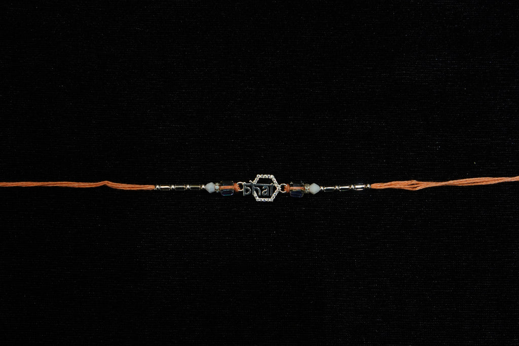 Silver Rakhi with Roli Chawal