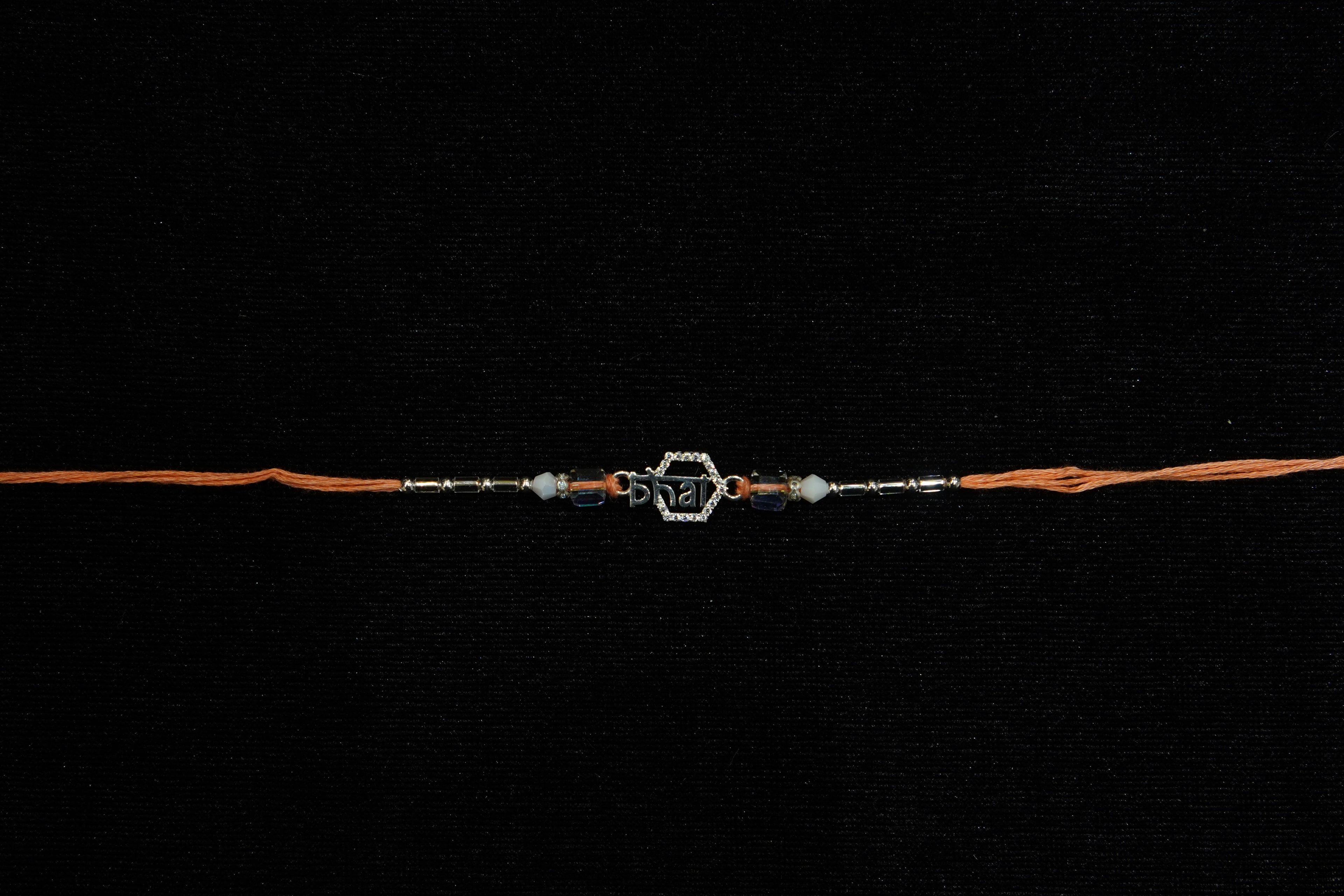 Silver Rakhi with Roli Chawal