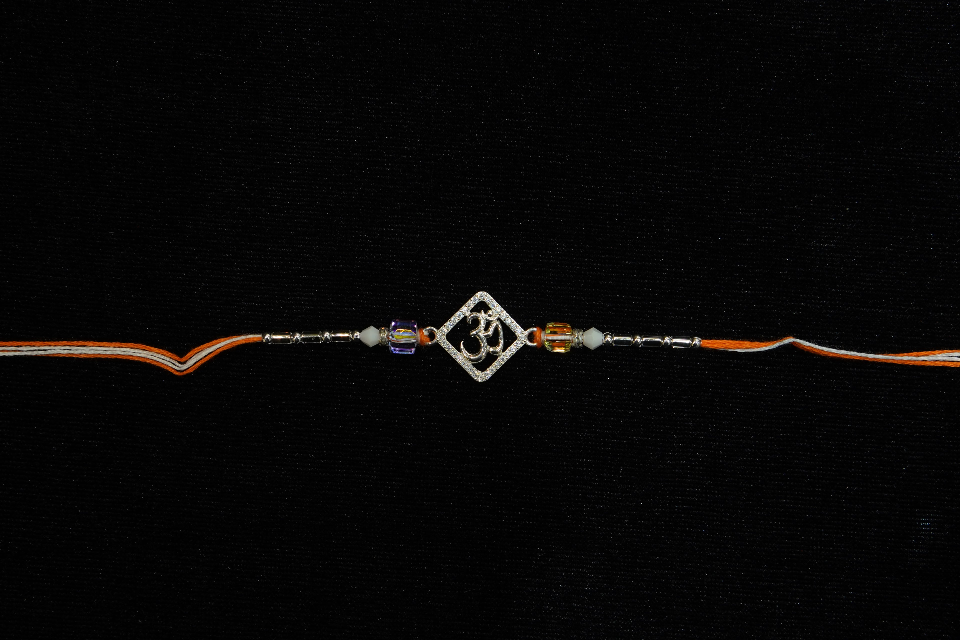 Silver Rakhi with Roli Chawal