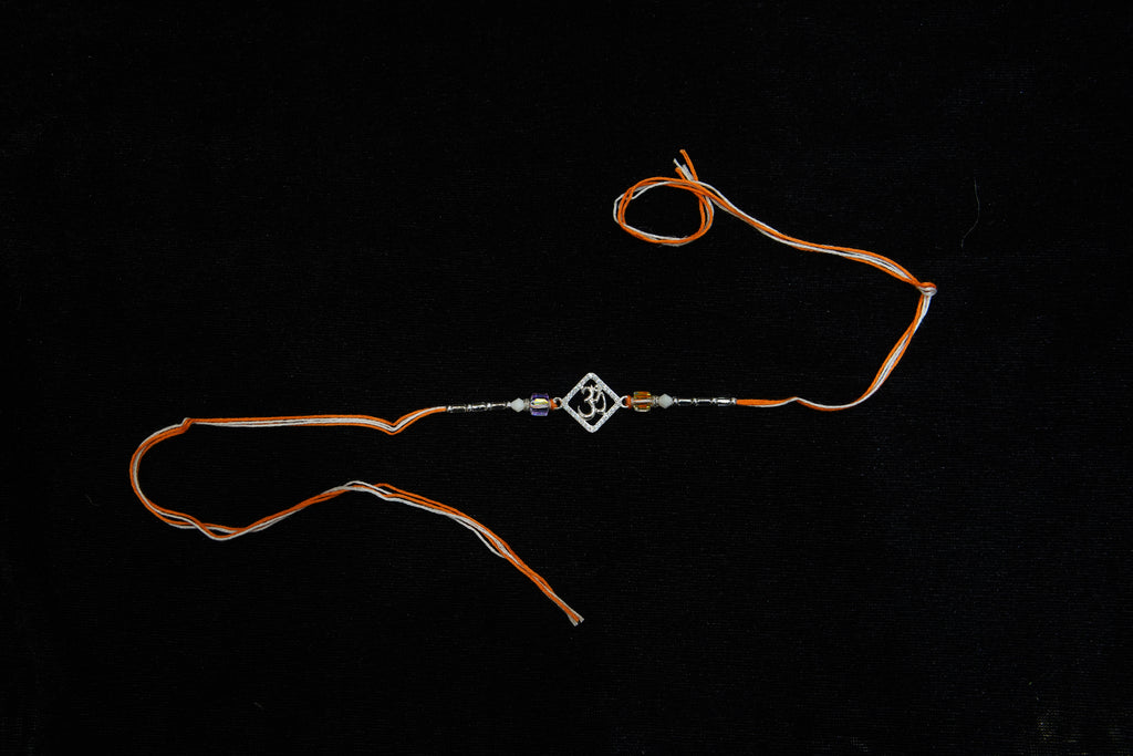 Silver Rakhi with Roli Chawal