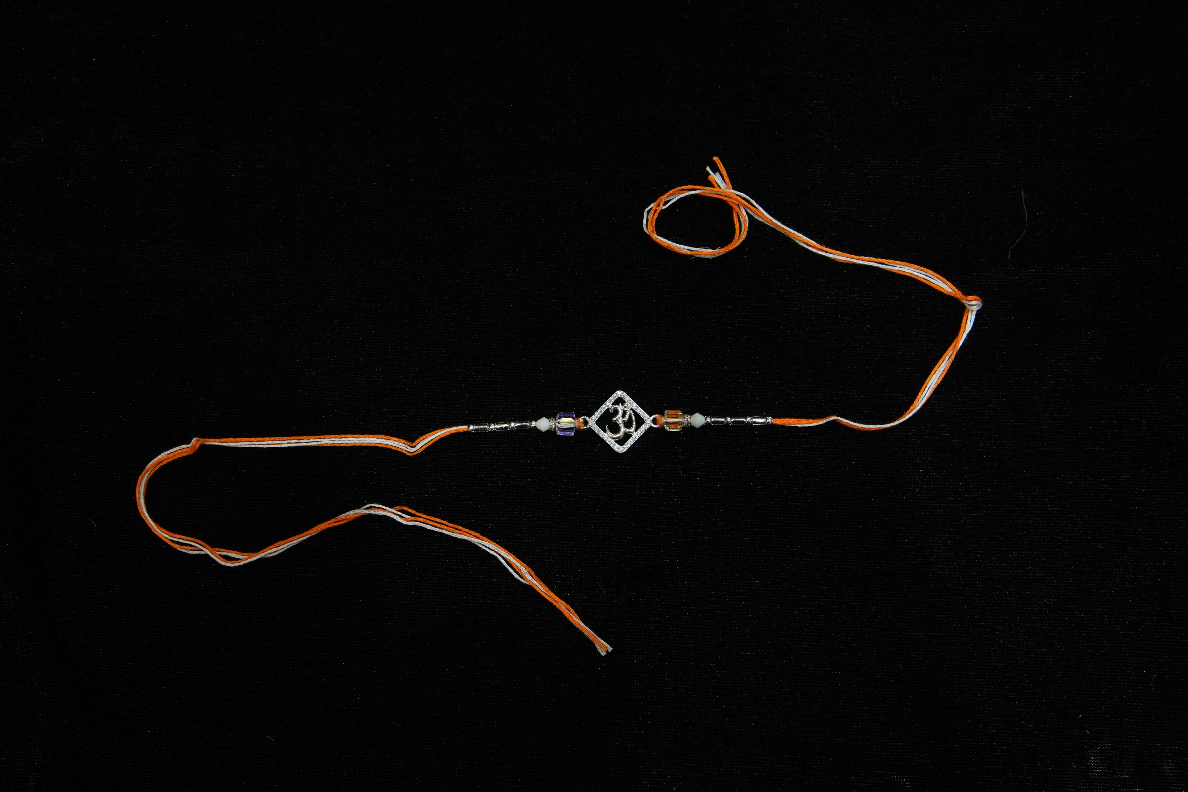 Silver Rakhi with Roli Chawal