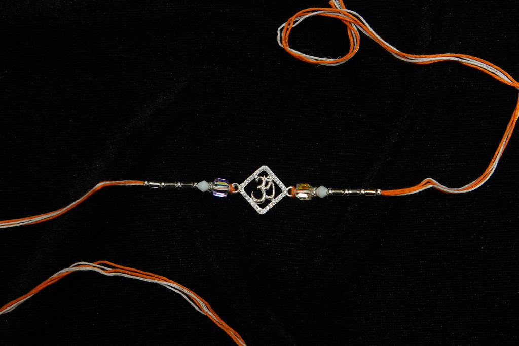 Silver Rakhi with Roli Chawal