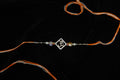 Silver Rakhi with Roli Chawal