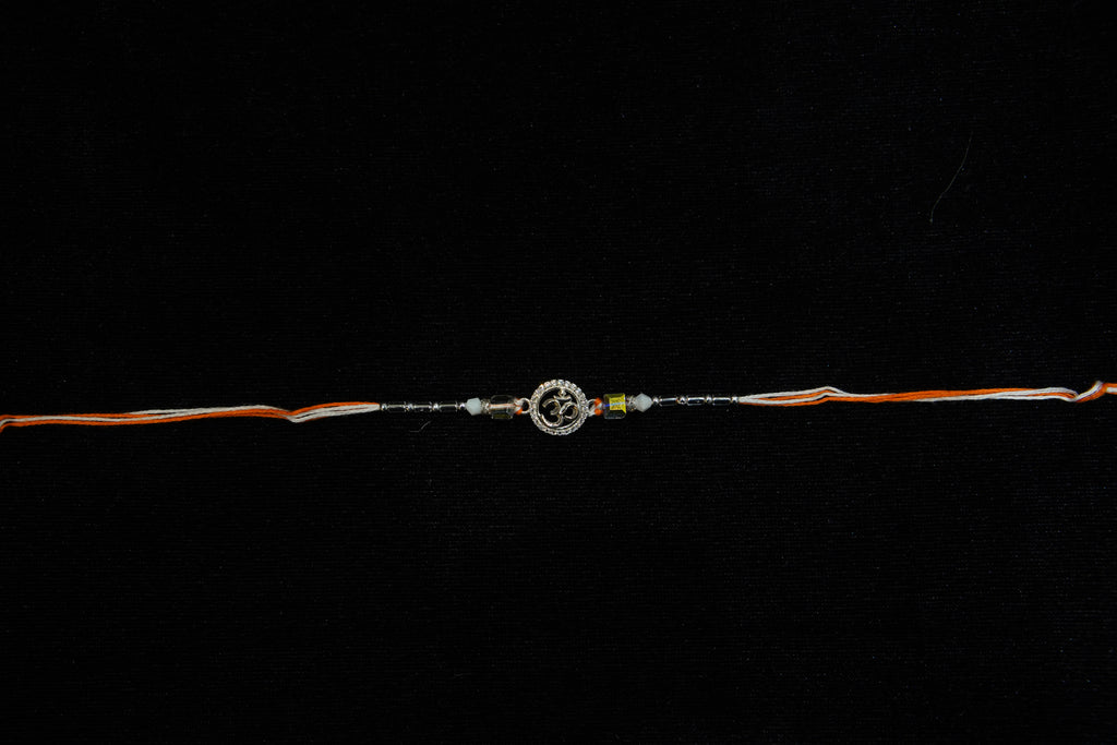 Silver Rakhi with Roli Chawal