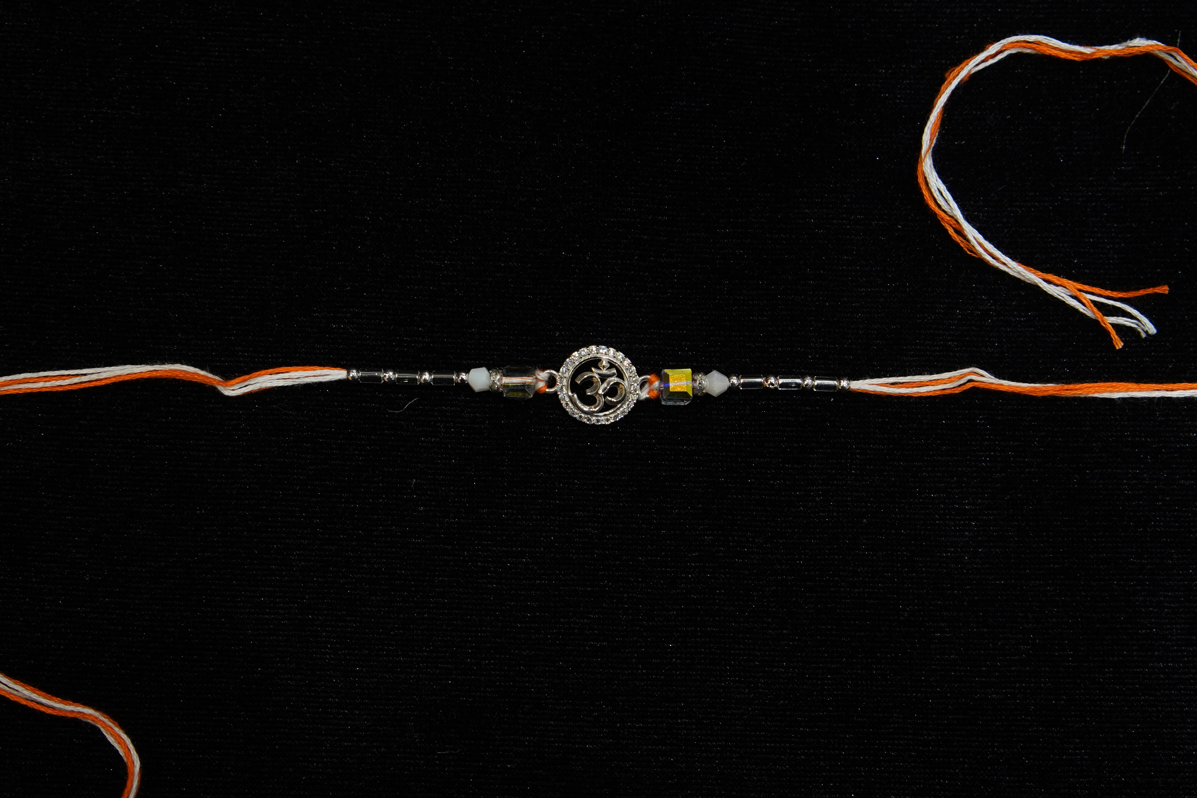 Silver Rakhi with Roli Chawal