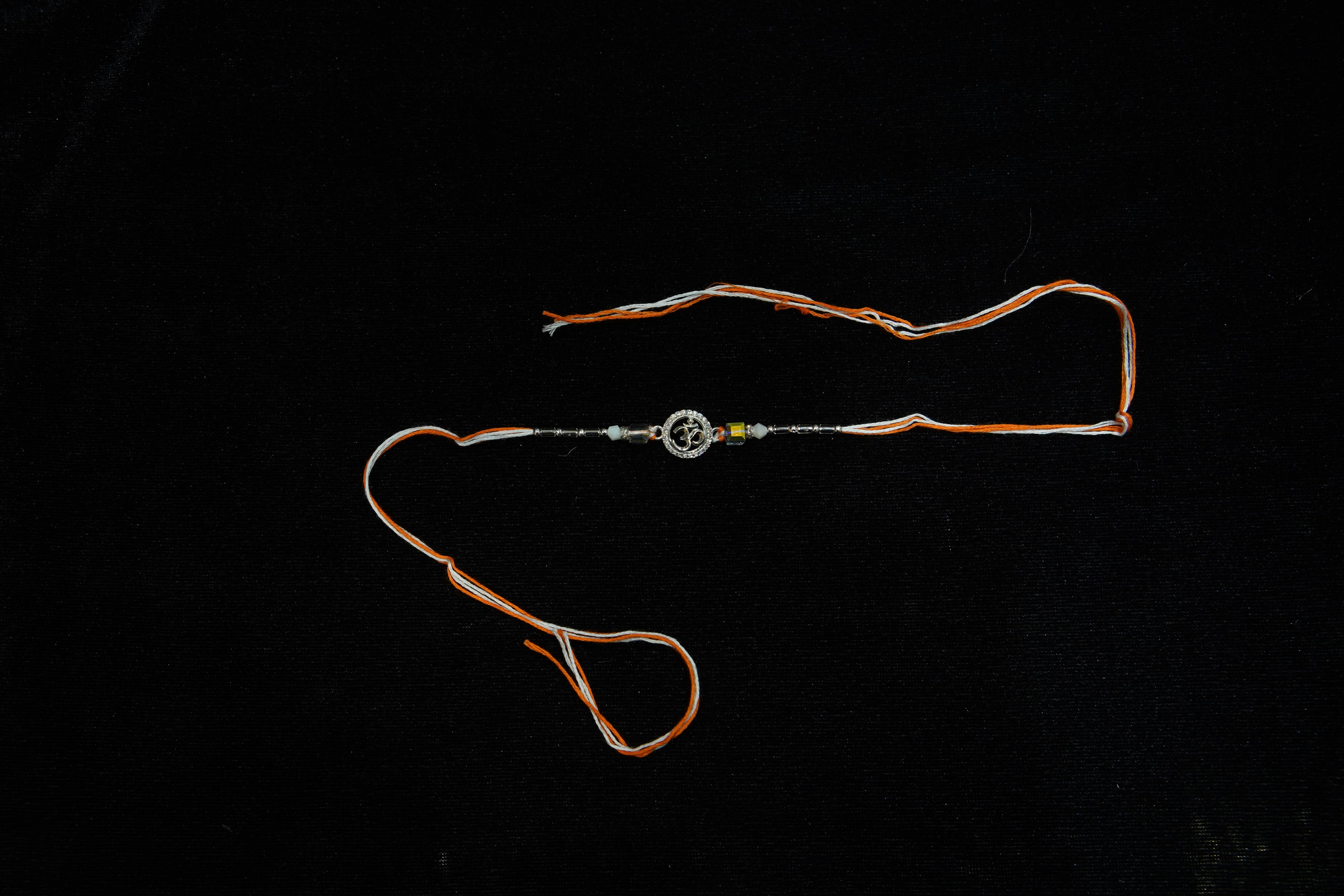 Silver Rakhi with Roli Chawal