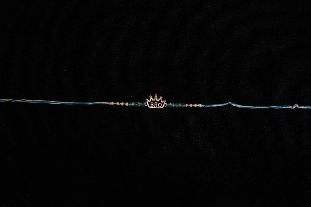 Silver Rakhi with Roli Chawal