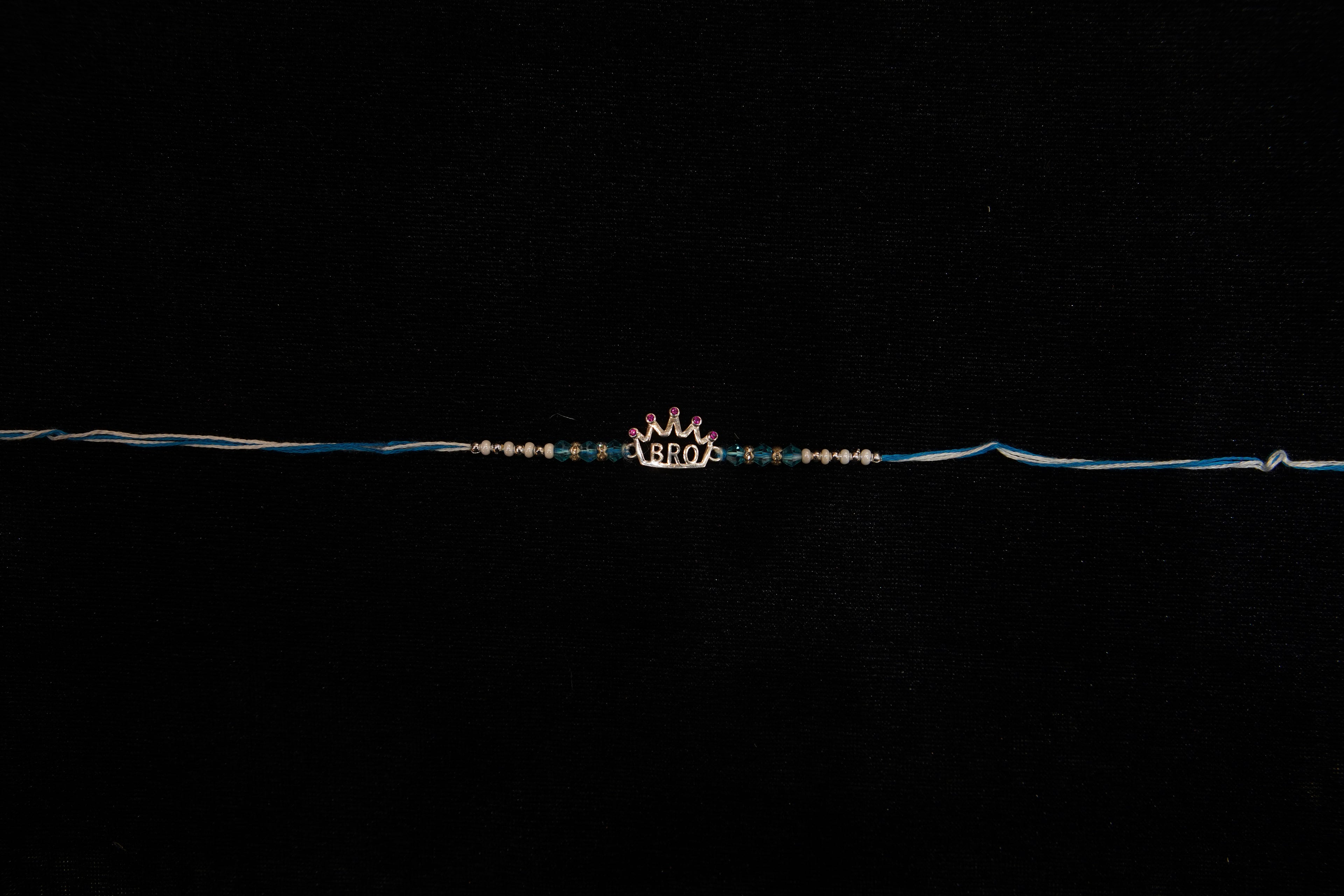 Silver Rakhi with Roli Chawal